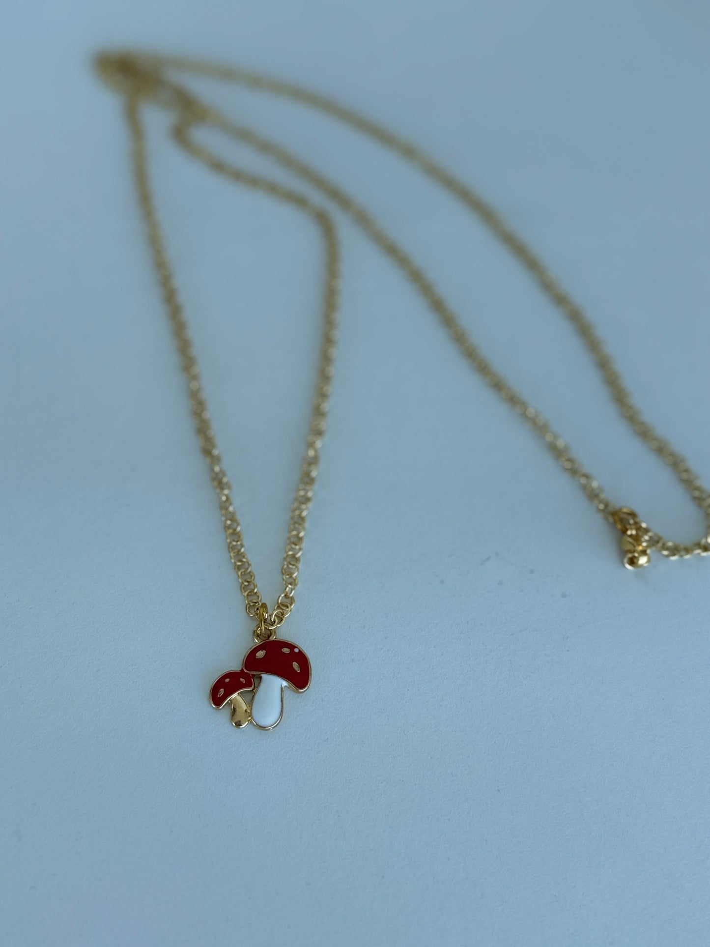 Mercurial Whimsical Gold Charm Necklace | Collar Mercurial de Charms Dorados y Encanto Lúdico - Luna by Cinthia Garcia