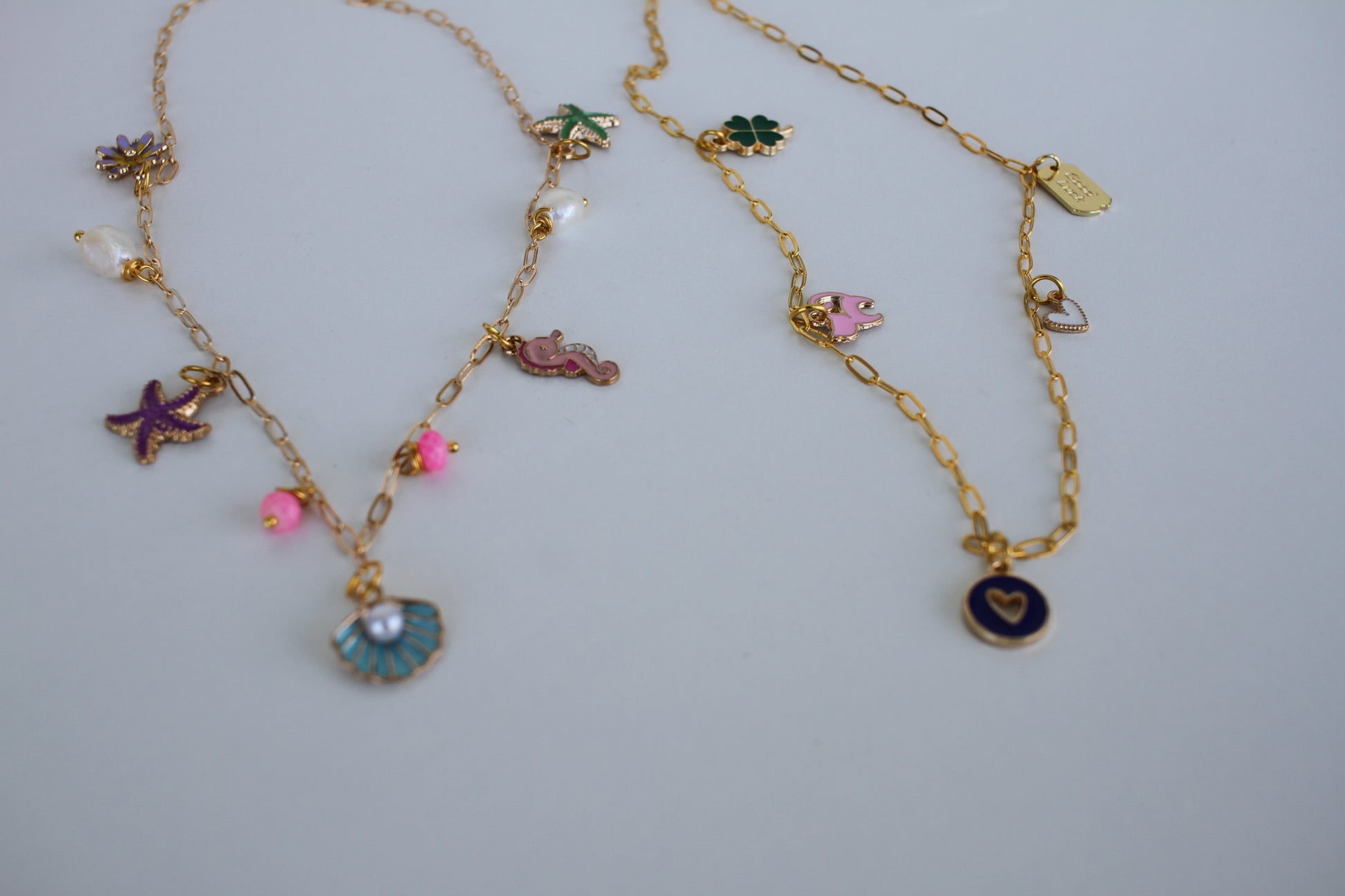 Gold Sea Charm Necklace – Starfish, Seashell & Seahorse Pendant Jewelry - Luna by Cinthia Garcia