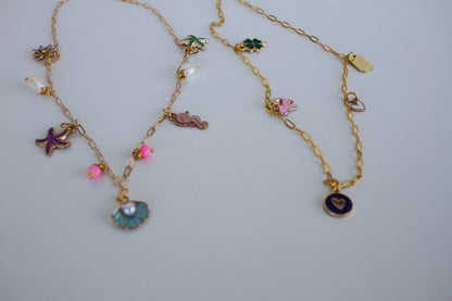 Gold Sea Charm Necklace – Starfish, Seashell & Seahorse Pendant Jewelry - Luna by Cinthia Garcia