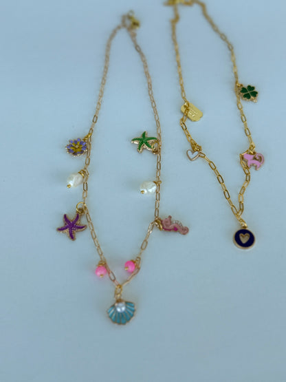 Gold Sea Charm Necklace – Starfish, Seashell & Seahorse Pendant Jewelry - Luna by Cinthia Garcia