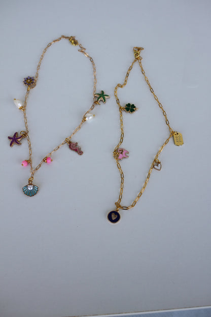 Gold Sea Charm Necklace – Starfish, Seashell & Seahorse Pendant Jewelry - Luna by Cinthia Garcia
