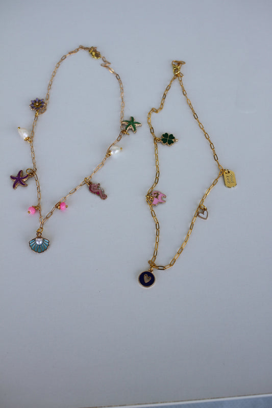 Gold Sea Charm Necklace – Starfish, Seashell & Seahorse Pendant Jewelry - Luna by Cinthia Garcia